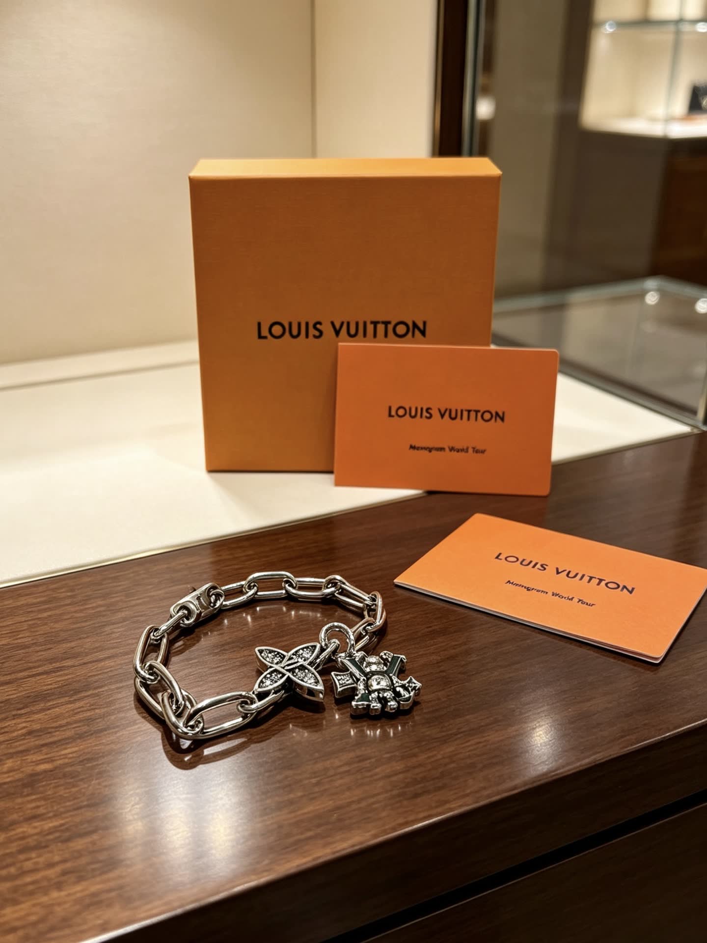Louis Vuitton Silver Charm Bracelet with Butterfly and Heart Charms